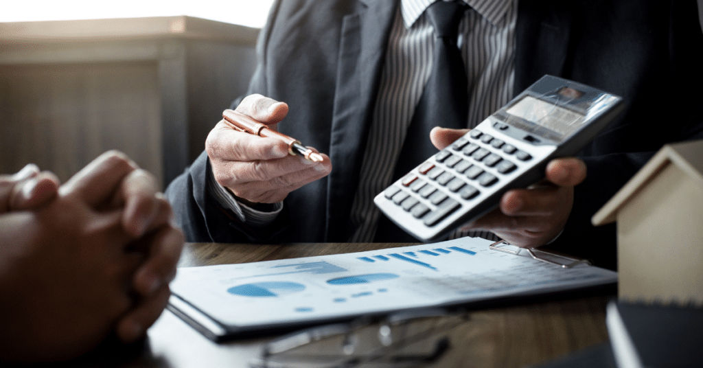 Accountant showing results from calculations during tax season